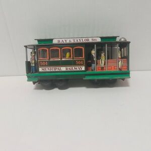 Source Unknown Bay & Taylor Sts. Toy Trolley - Green and Orange